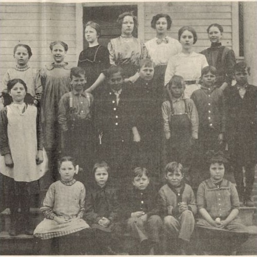 Blue School students outside the school