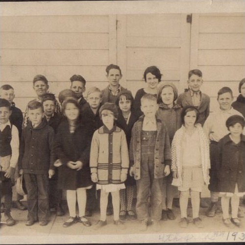 Flood School students posed at the school building in 1930