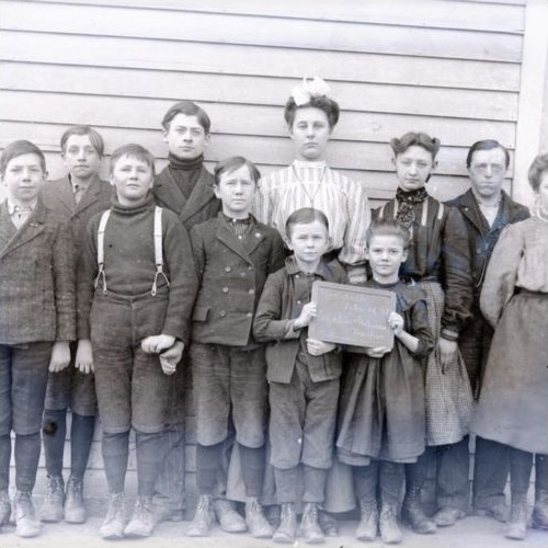 Randall School students posed outside the school