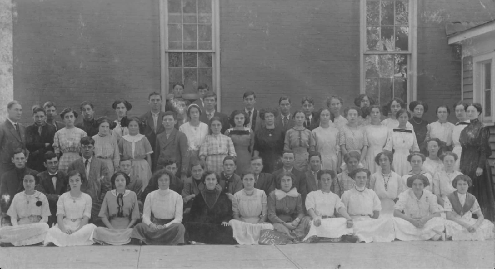 Maroa High School students and faculty posed outside the school in 1911