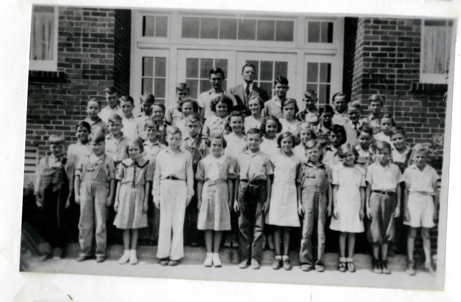Forsyth Grade School students standing in front of the school building